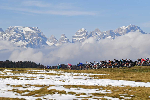 Why do professional cyclists train at altitude?